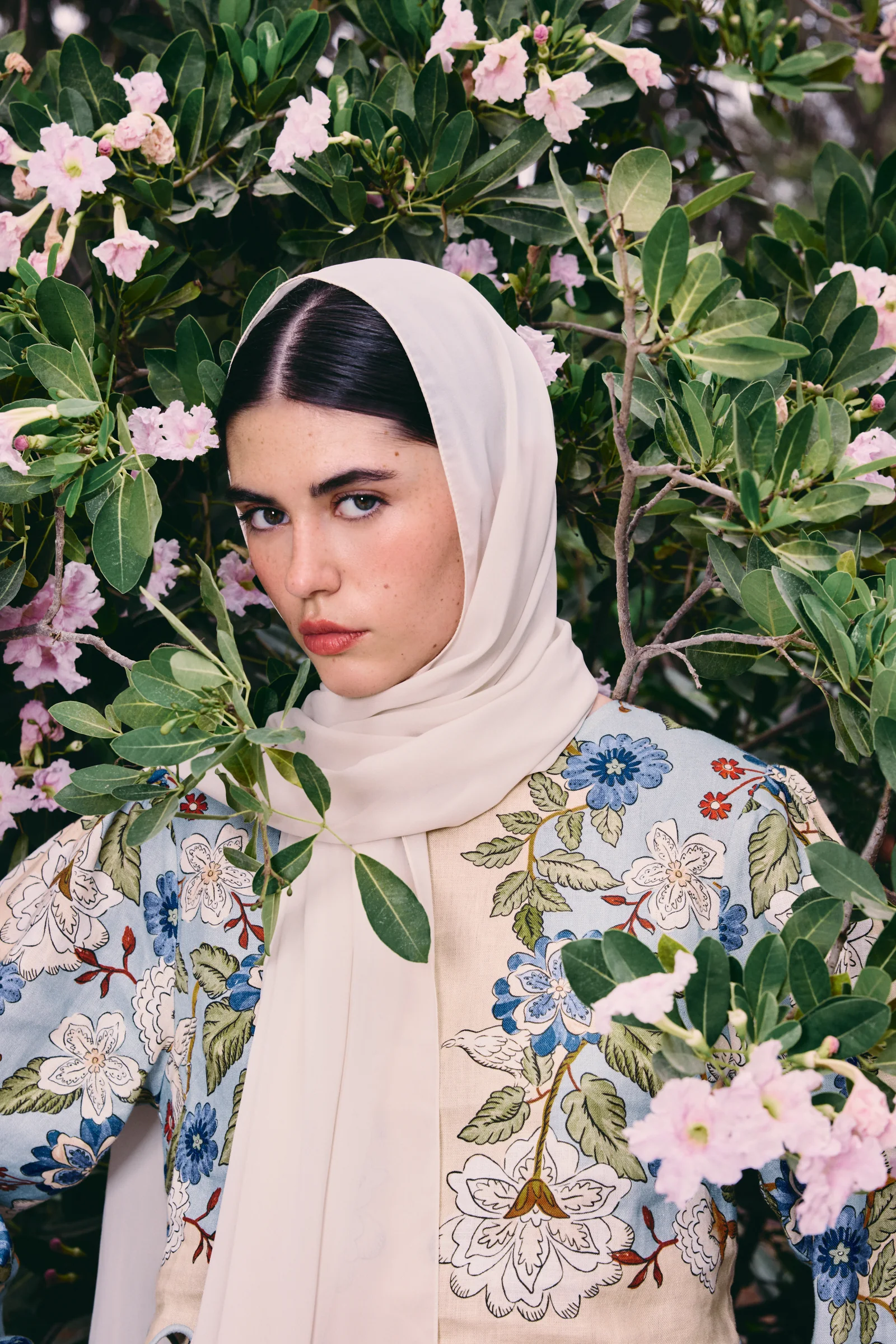Tryano Ya Hala Spring 2026 modest styling in embroidered floral jacket and cream scarf