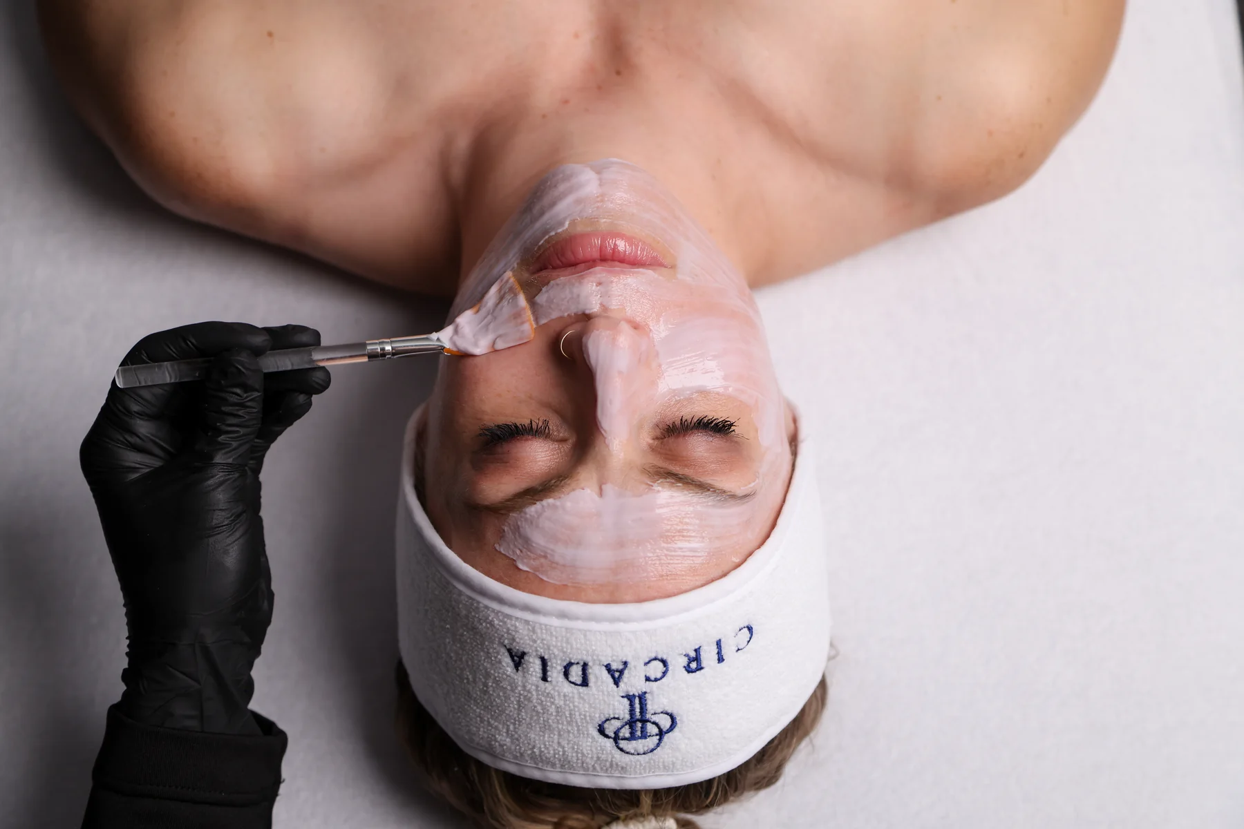 A calm professional facial using cooling globes