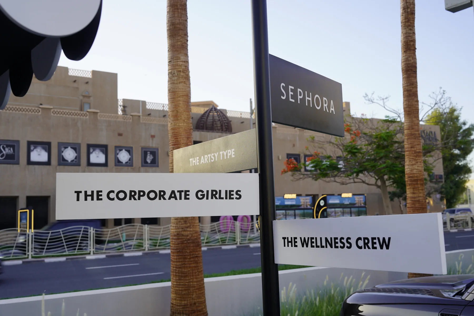 Sephora Beauty on Wheels community signage in Dubai reading The Corporate Girlies, The Wellness Crew and The Beauty Type