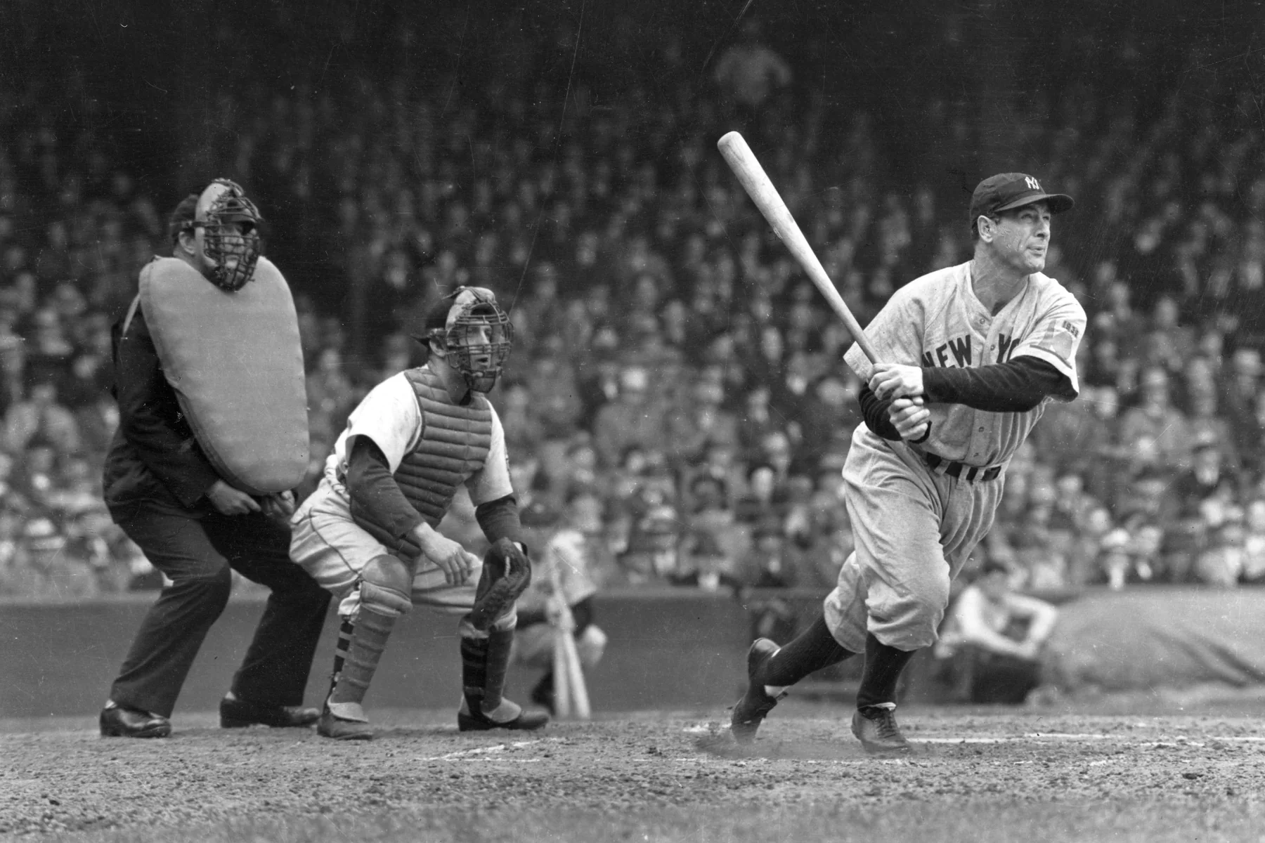 Lou Gehrig of the New York Yankees at bat in a vintage black and white photograph