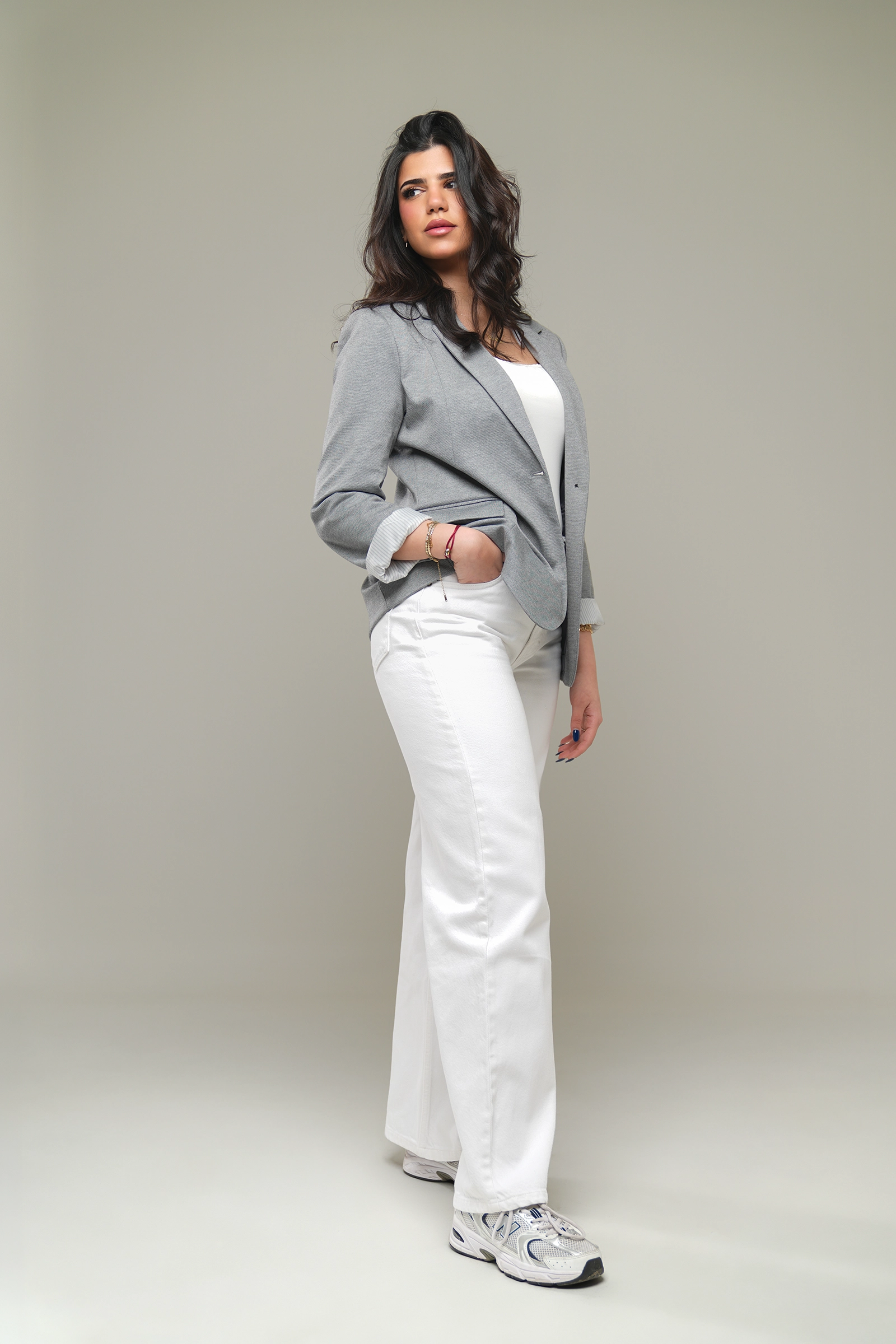 A fashion look photographed against a soft studio backdrop at Studio Letouch