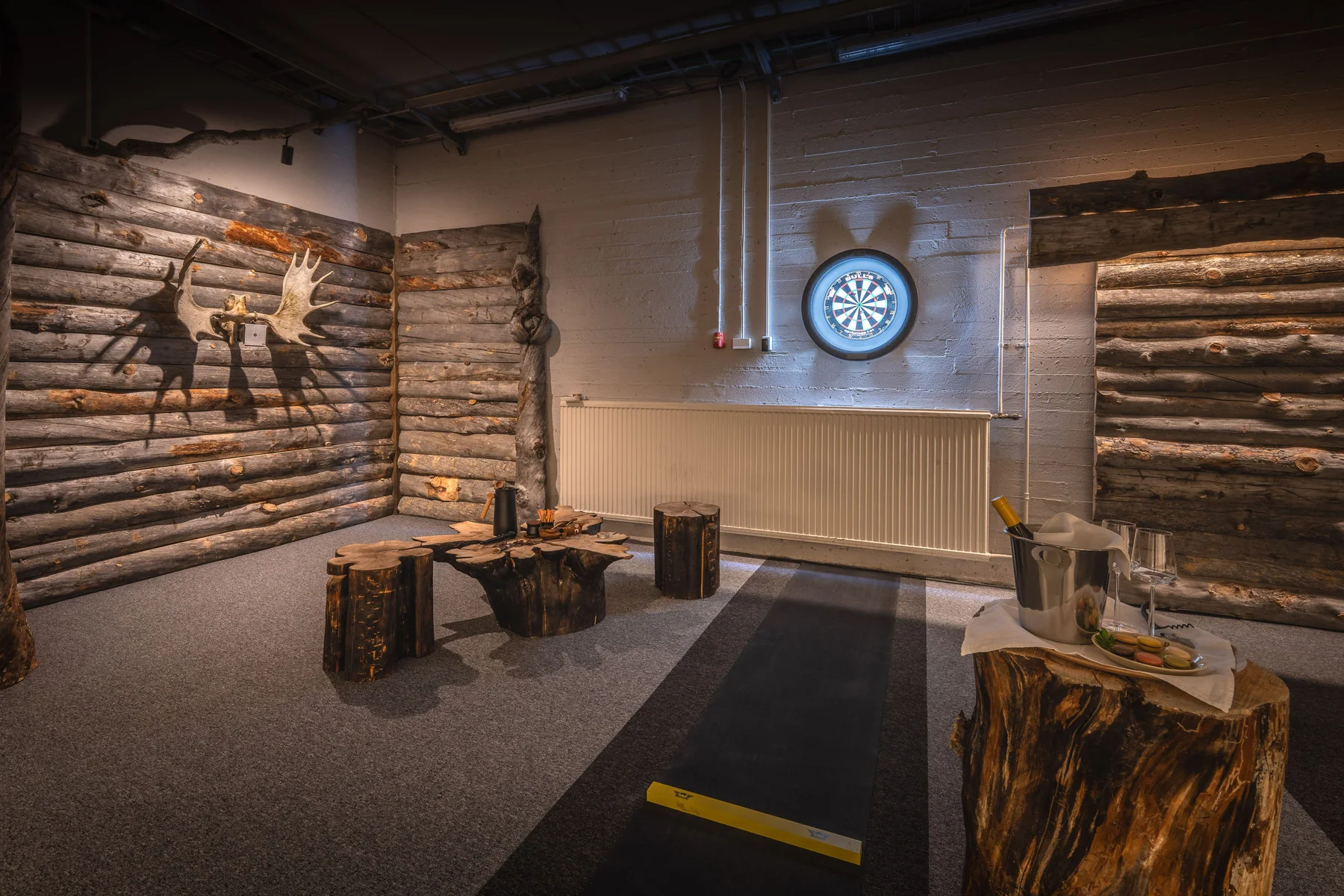 A leisure space at Octola III, with a games den and darts