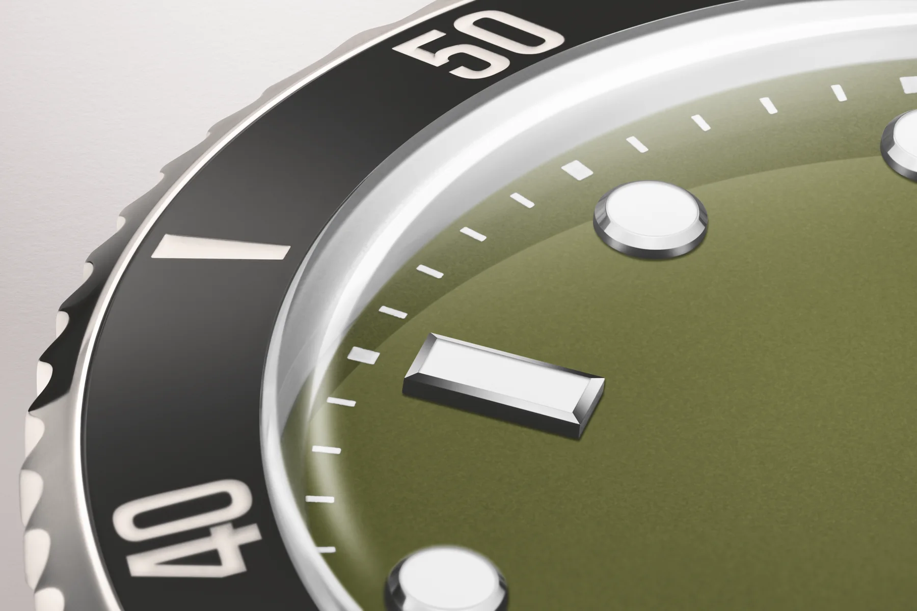 Macro of the Oris Divers Date olive dial and black ceramic bezel with luminous markers