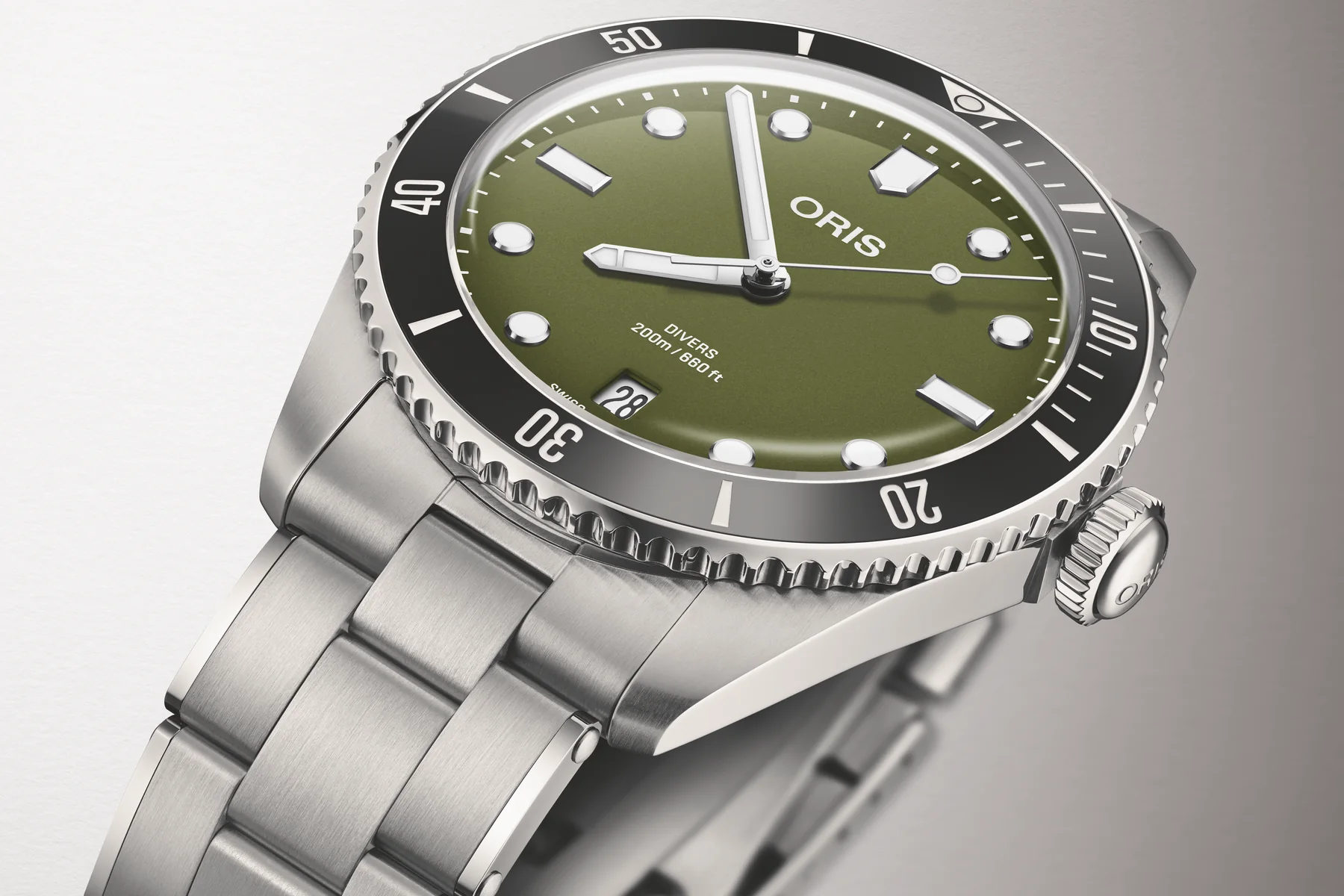 Oris Divers Date olive green shown in profile on its steel bracelet