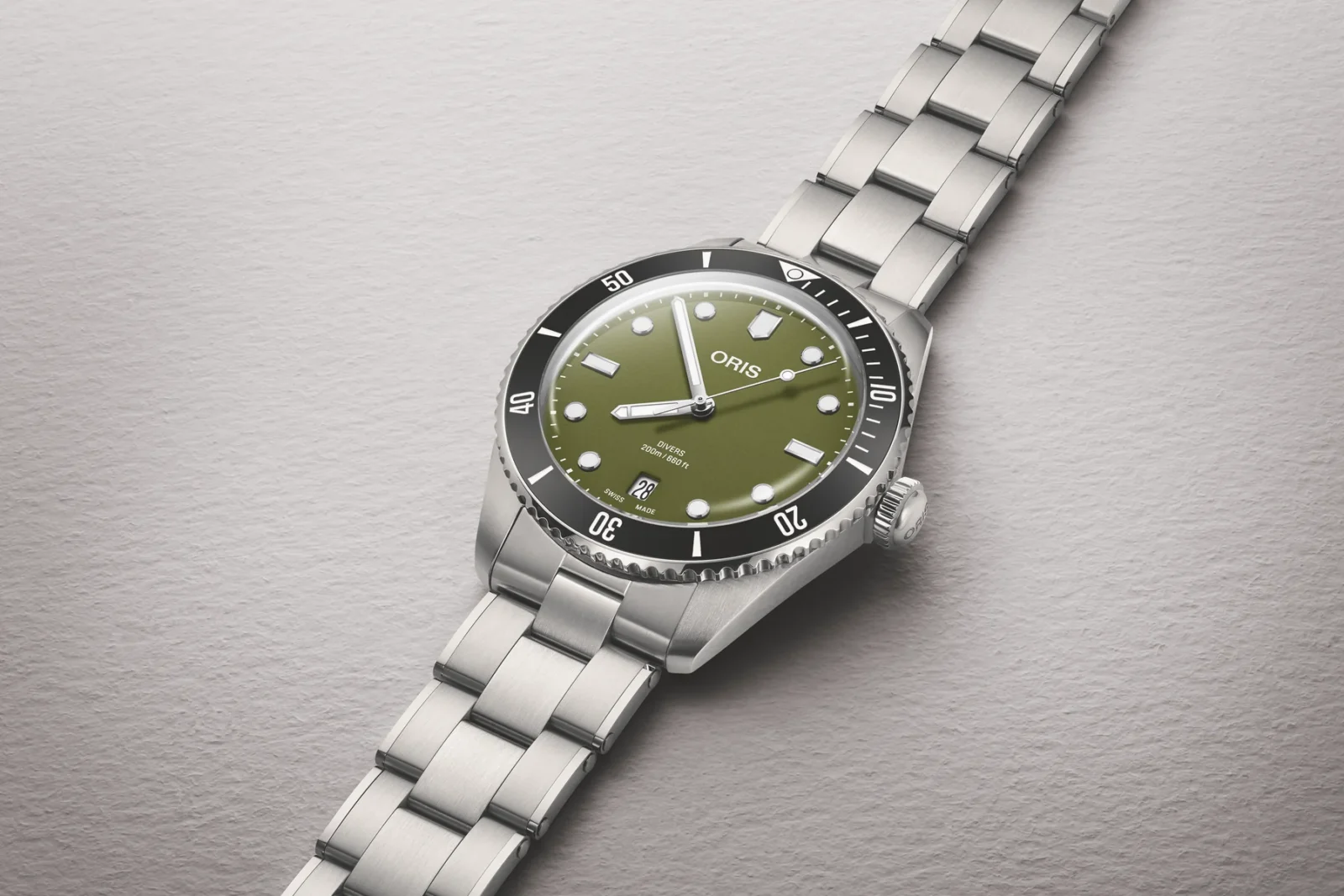 Oris Divers Date in olive green on a stainless steel bracelet