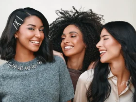 Three friends together in the MY SEPHORA beauty campaign by Sephora Middle East, one wearing a Sephora hair clip