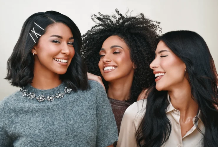Three friends together in the MY SEPHORA beauty campaign by Sephora Middle East, one wearing a Sephora hair clip