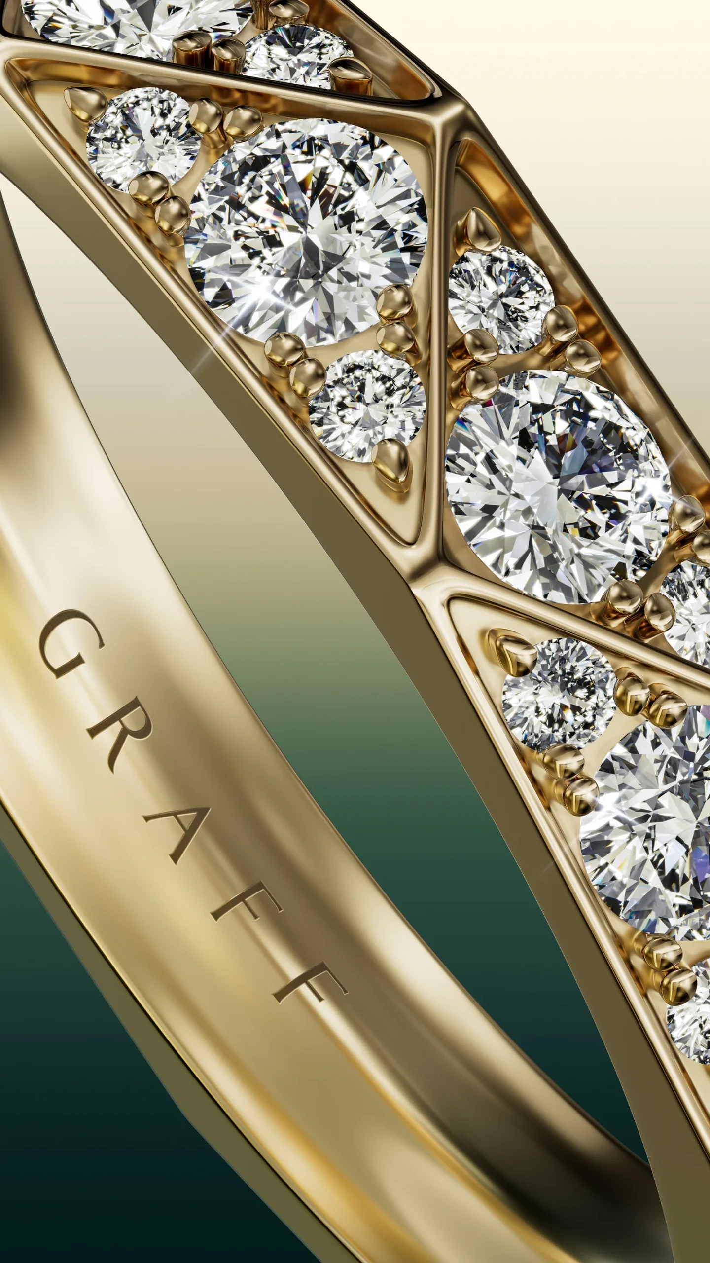 A Laurence Graff Signature faceted gold ring set with pavé diamonds