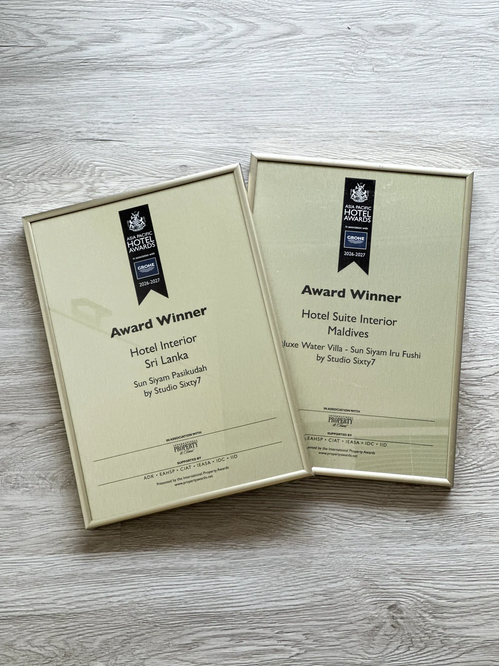The two Asia Pacific Hotel Awards winner plaques for Sun Siyam Pasikudah and Sun Siyam Iru Fushi