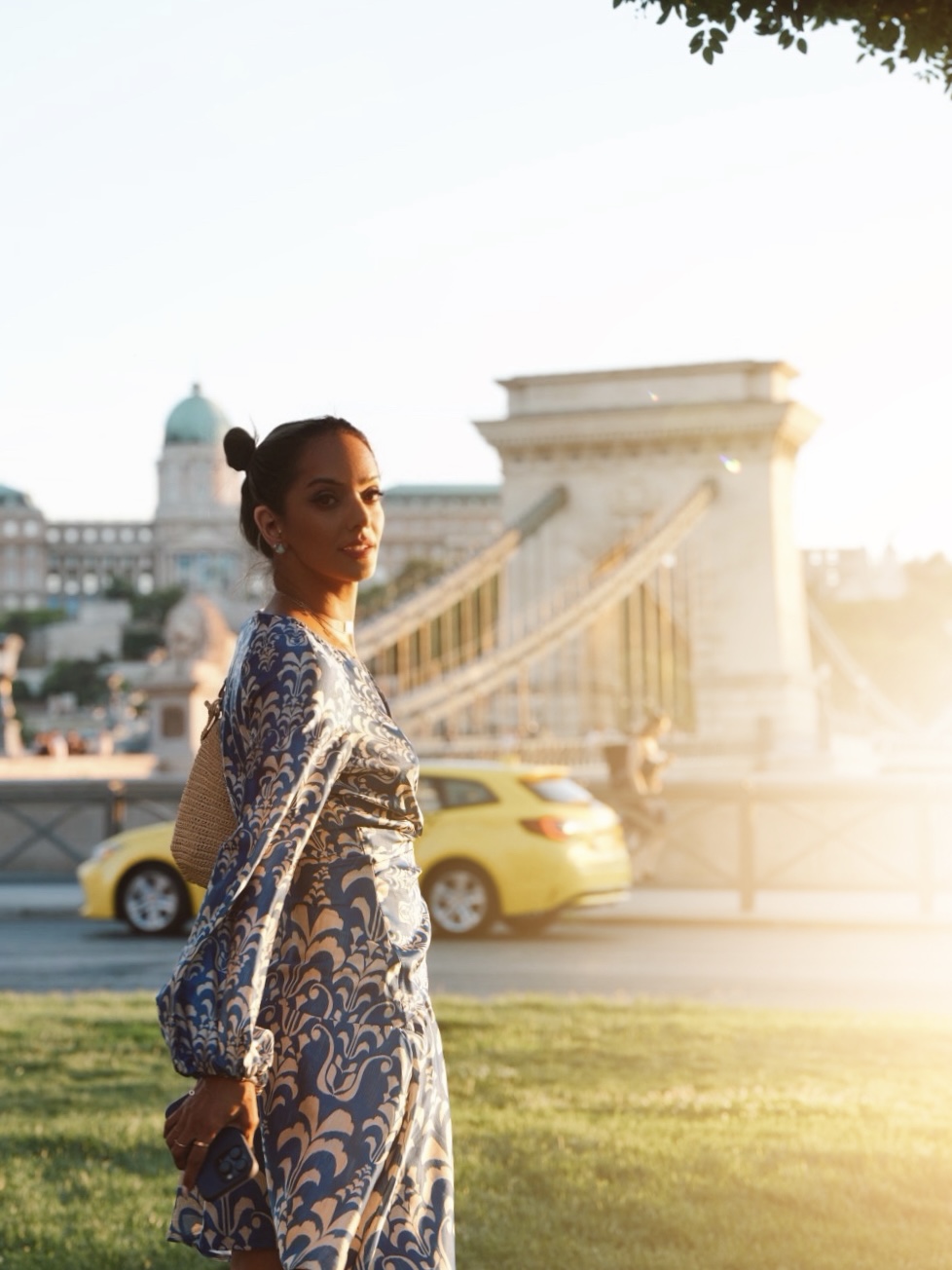 Fatima AlMattar at golden hour on the Chain Bridge in Budapest