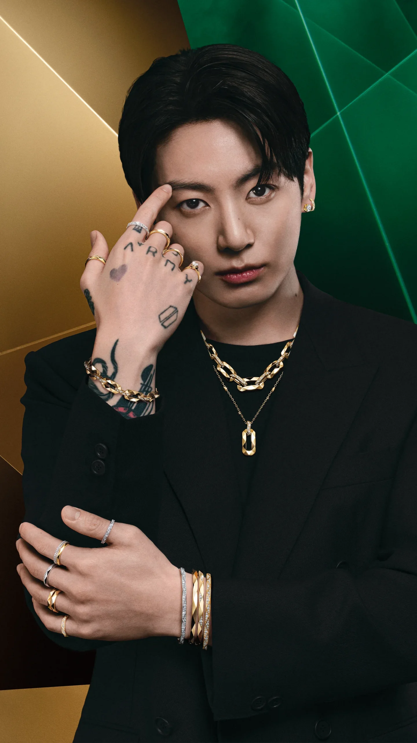 Jung Kook in unisex goldwear from the Laurence Graff Signature collection