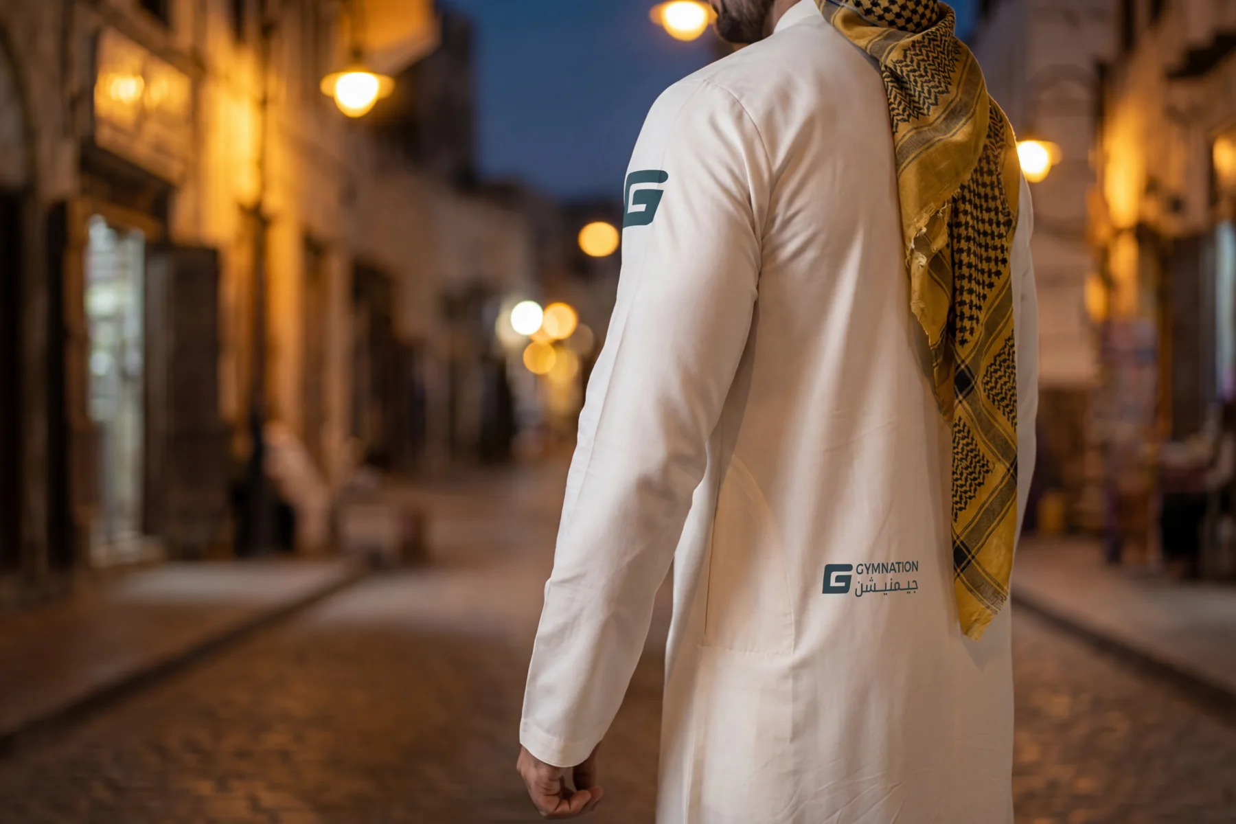 The GymNation Muscle Thobe worn in a Saudi evening setting