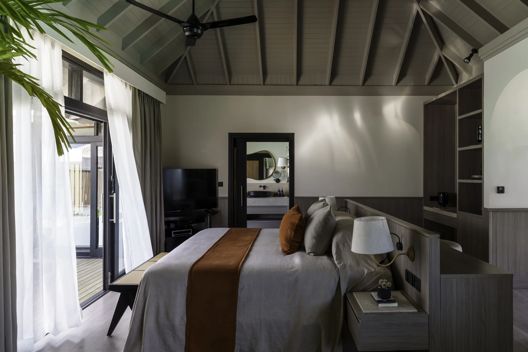 Reimagined Deluxe Water Villa interior at Sun Siyam Iru Fushi, Maldives, designed by Studio Sixty7