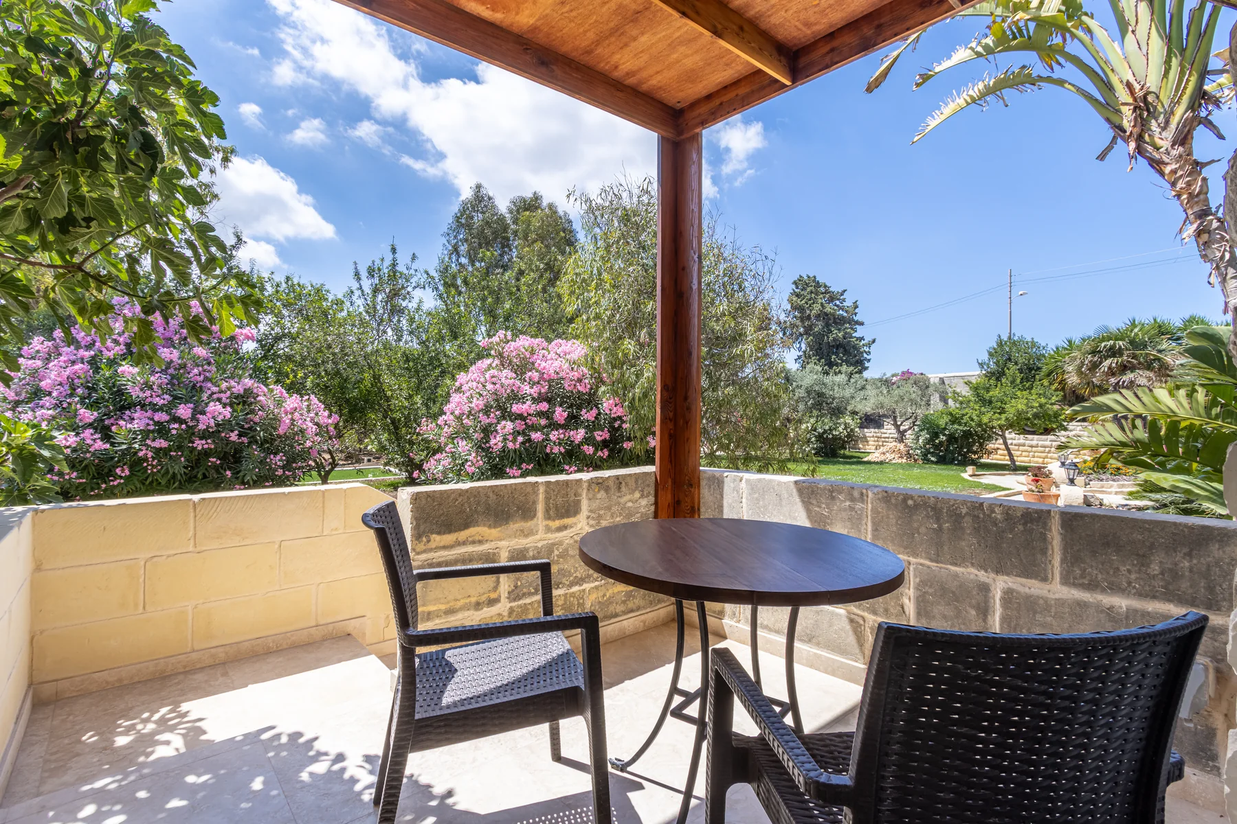 The private garden terrace of Pool Bungalow Suite 2 at Villa Barumbara