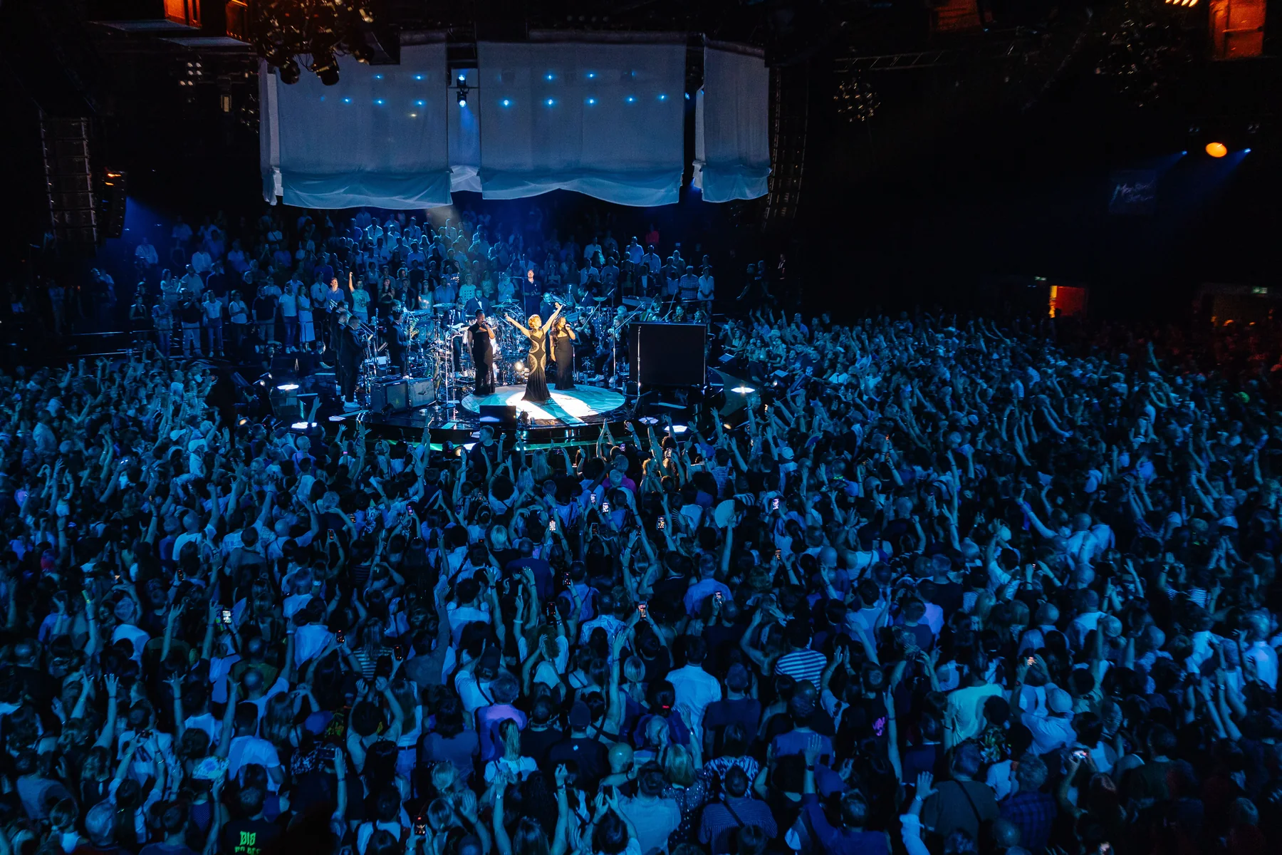 RAYE performing on stage at the Montreux Jazz Festival, photographed by Marc Ducrest for Audemars Piguet