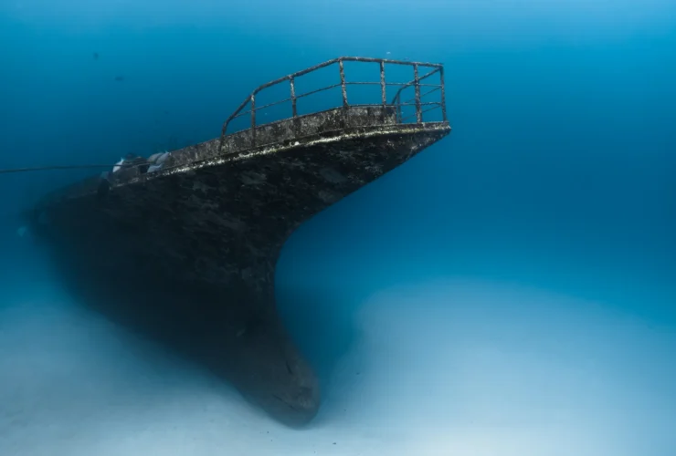 Diver exploring the newly sunk 66-metre shipwreck dive site at Siyam World Maldives