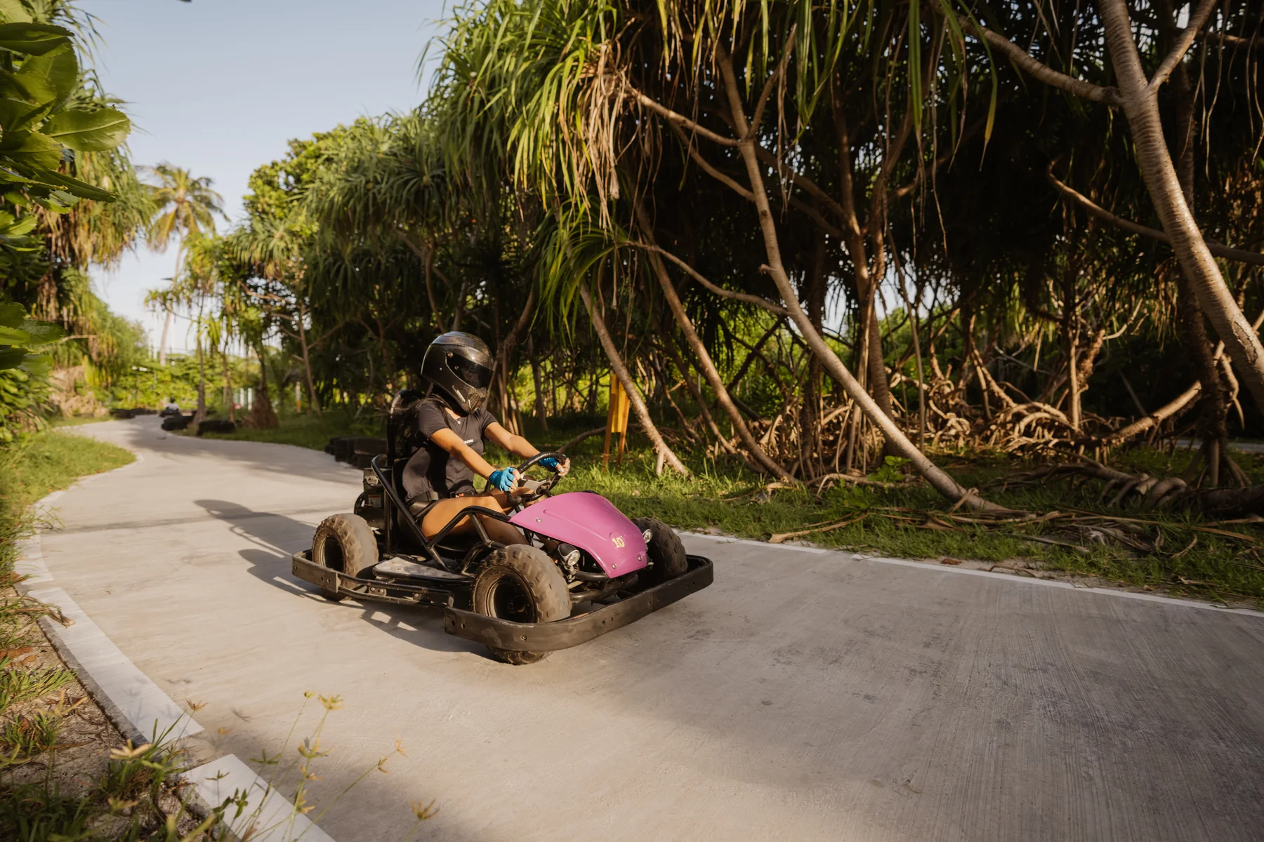 Guests racing electric go-karts at Siyam World Maldives