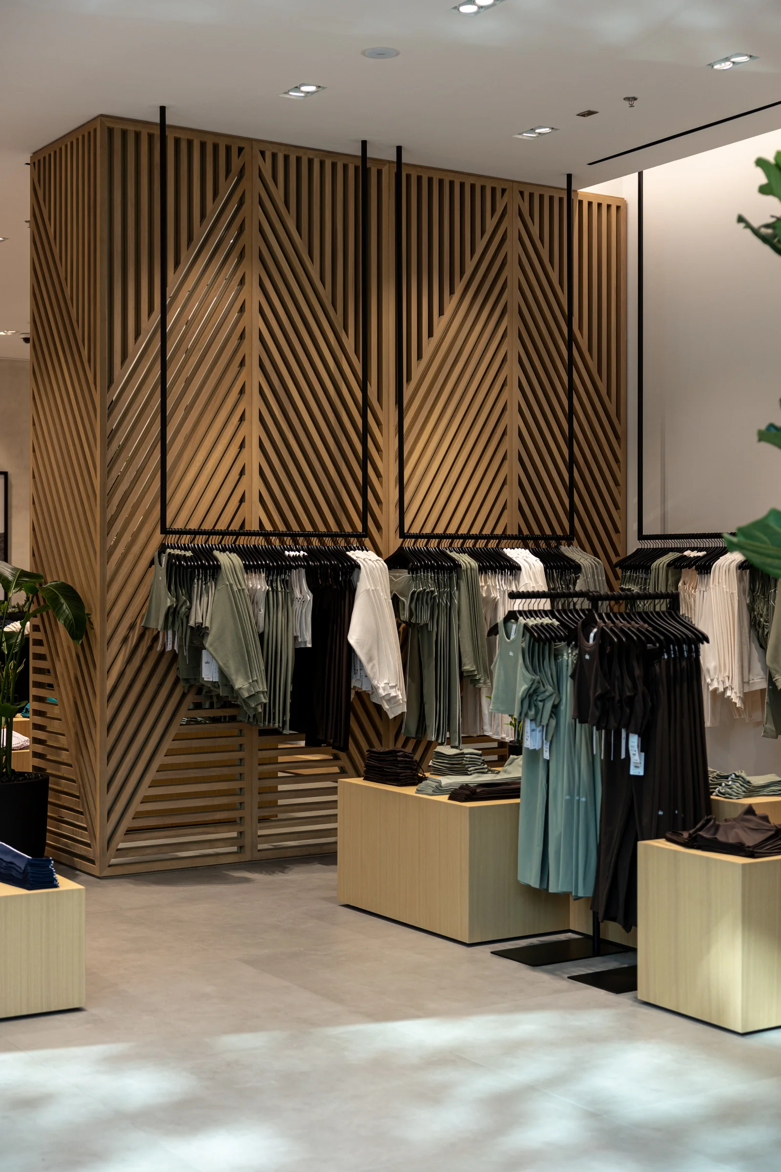 Rails of ALO apparel in sage and neutral tones