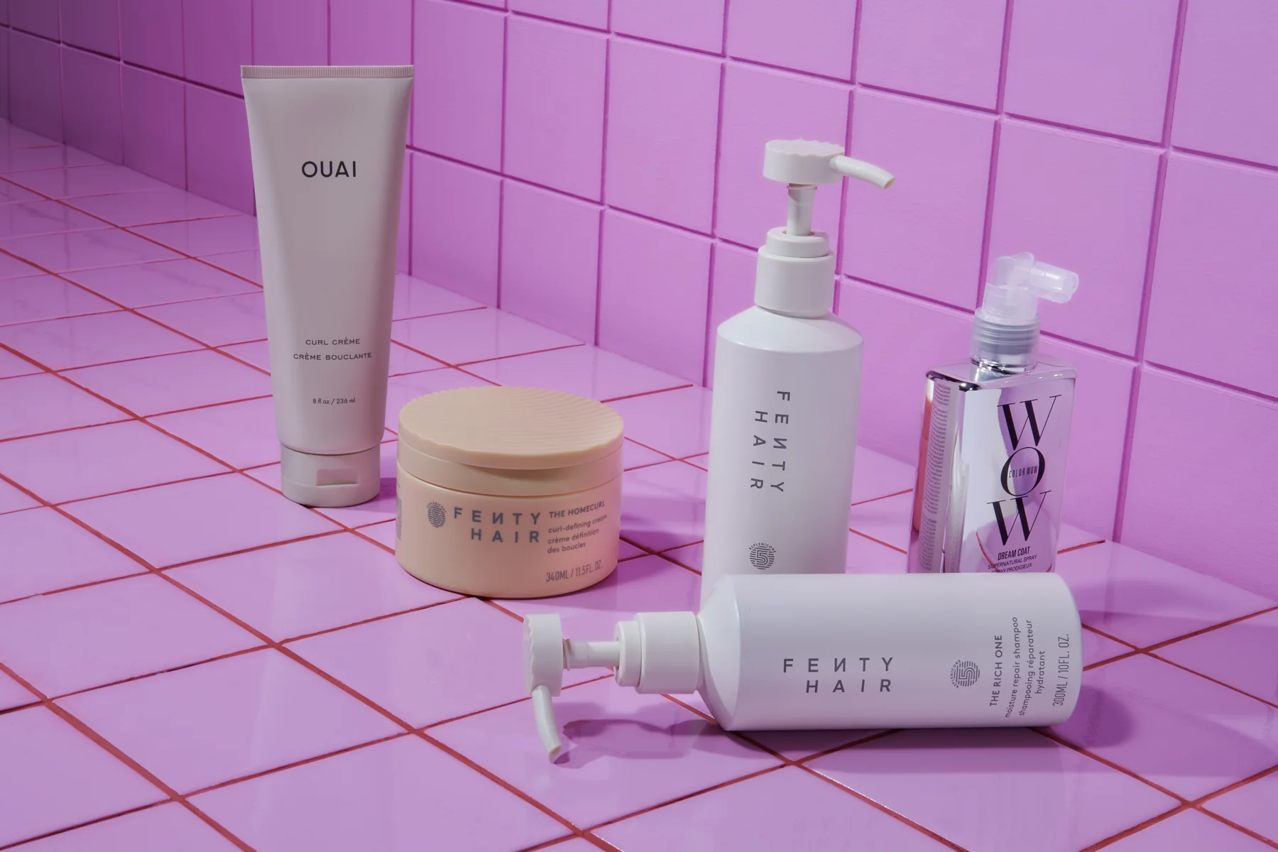 Sephora haircare creams and treatments on a pink backdrop
