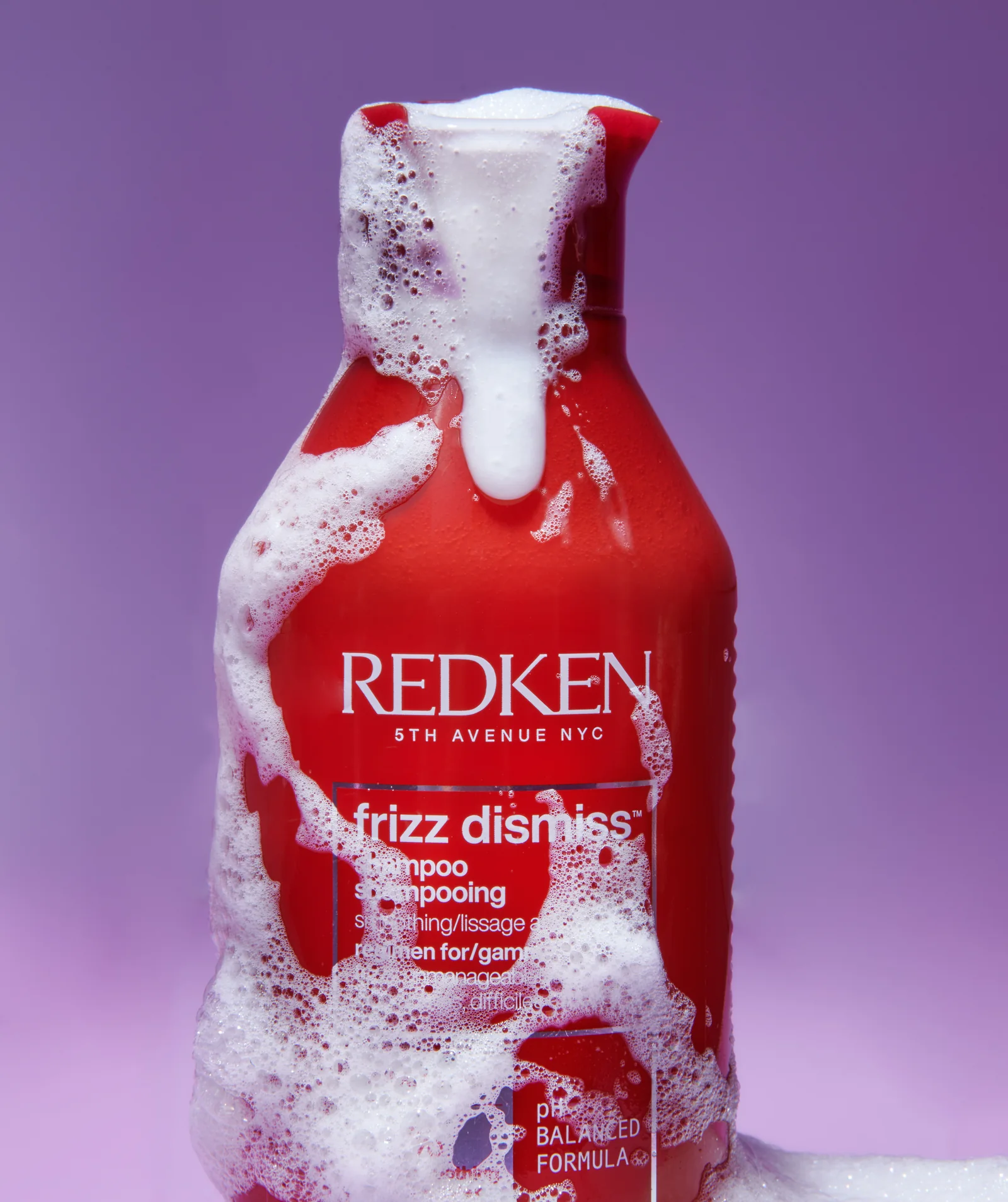 Redken Frizz Dismiss shampoo with foam on a lilac backdrop, Sephora haircare campaign