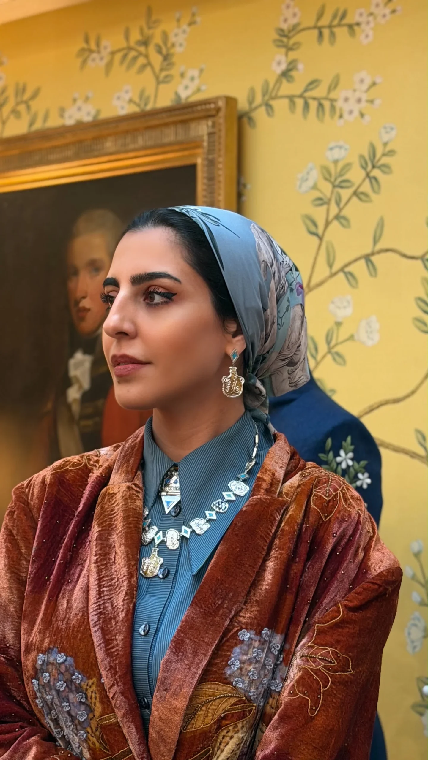 Farah Bastaki in a heritage coat with enamel jewellery