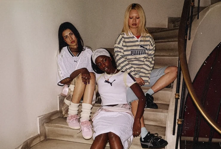 Regional muses styling the PUMA Suede Bloom in cream, black and powder pink on a staircase