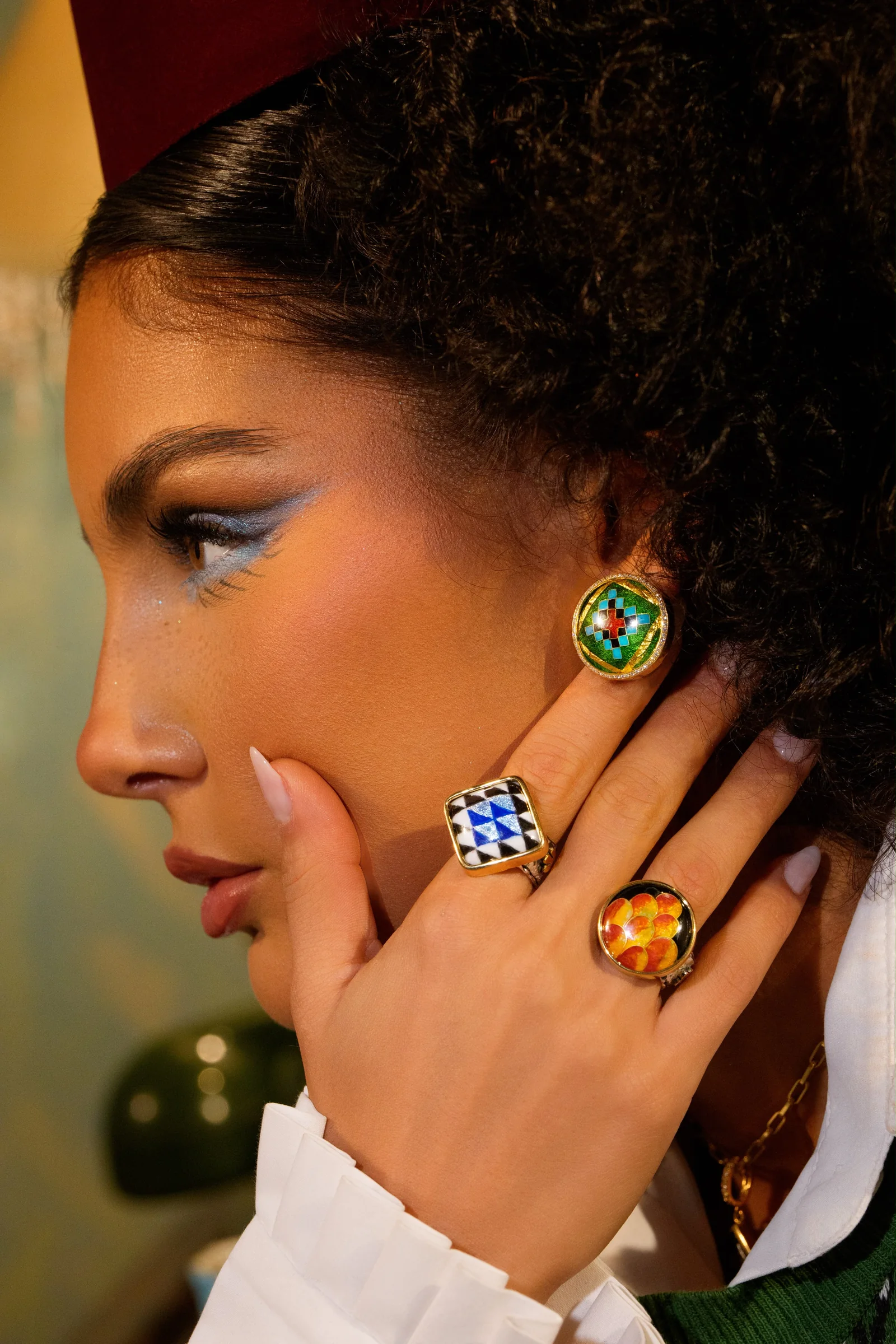 Farah Bastaki wearing enamel earrings