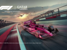 A Qatar Airways liveried Formula 1 car on track, promoting the Qatar Grand Prix 2026 stopover packages