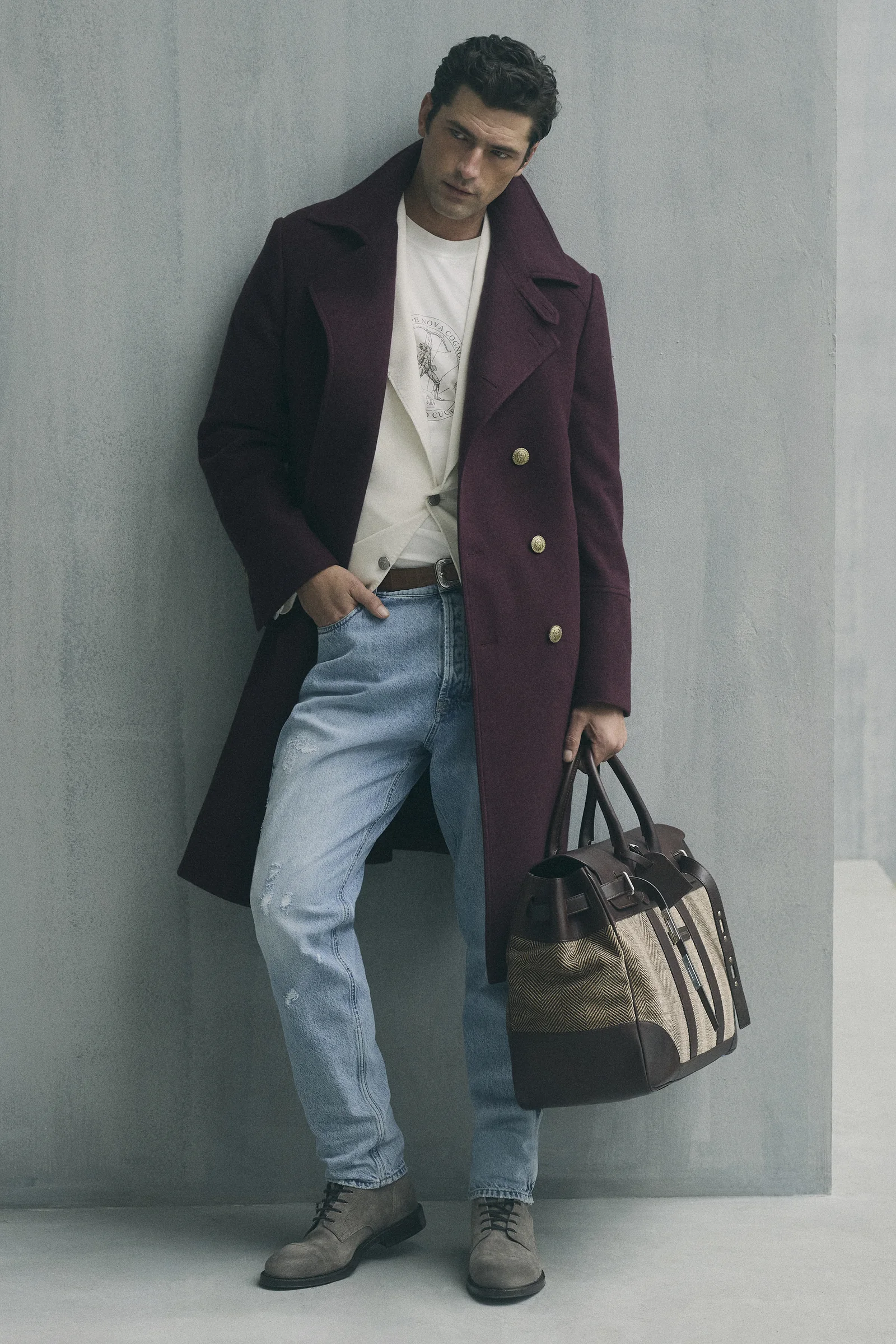 A Brunello Cucinelli shearling coat worn with denim, the contemporary explorer, Fall Winter 2026