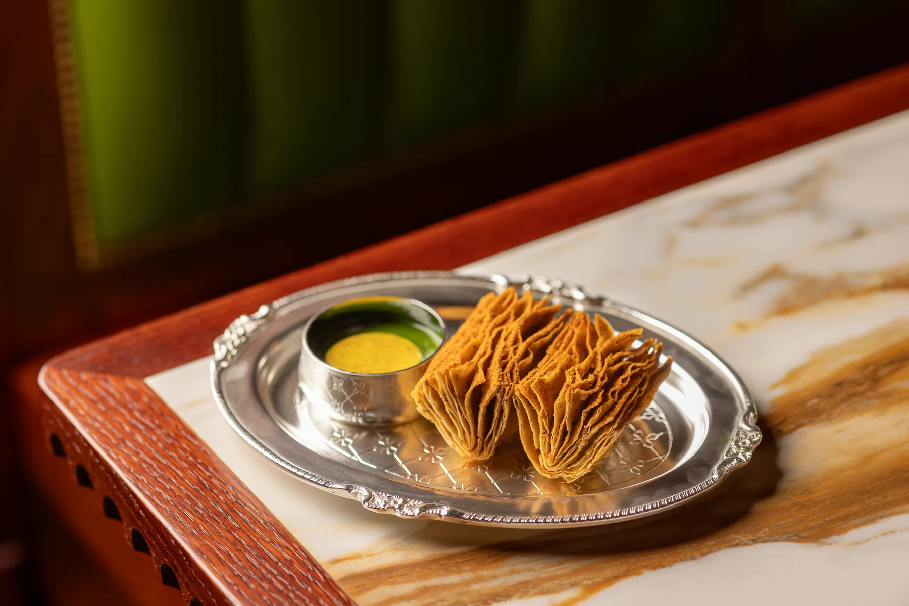Fatechand Kachori Chaat with green mango at Gymkhana Dubai