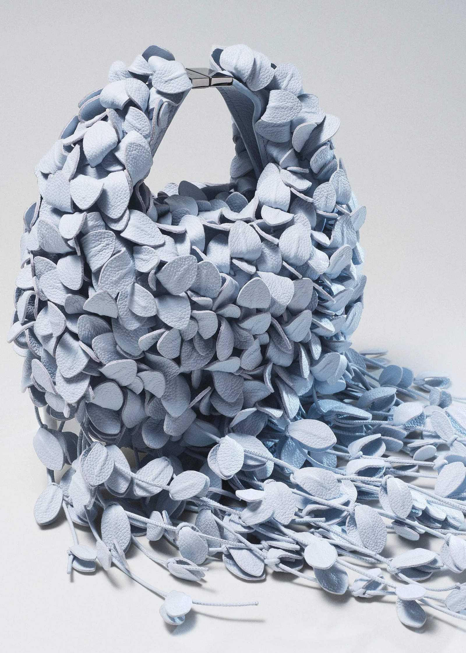 The Polene Beri Lif in Polar, a pale grey upcycled leather bag