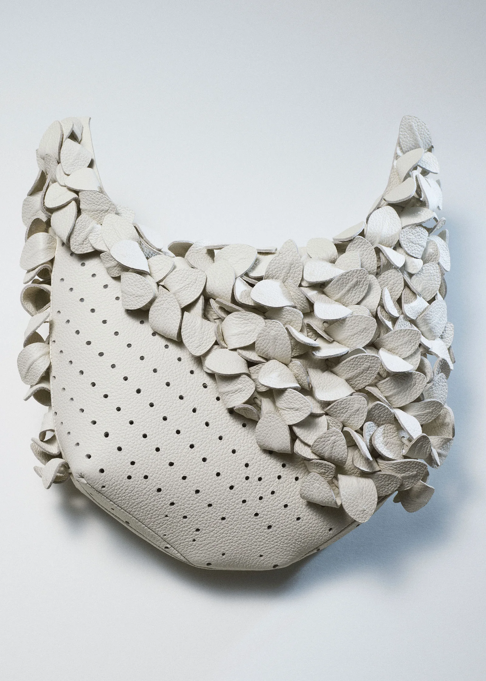 A detail of the Polene Beri Lif in Porcelain, leaves catching the light