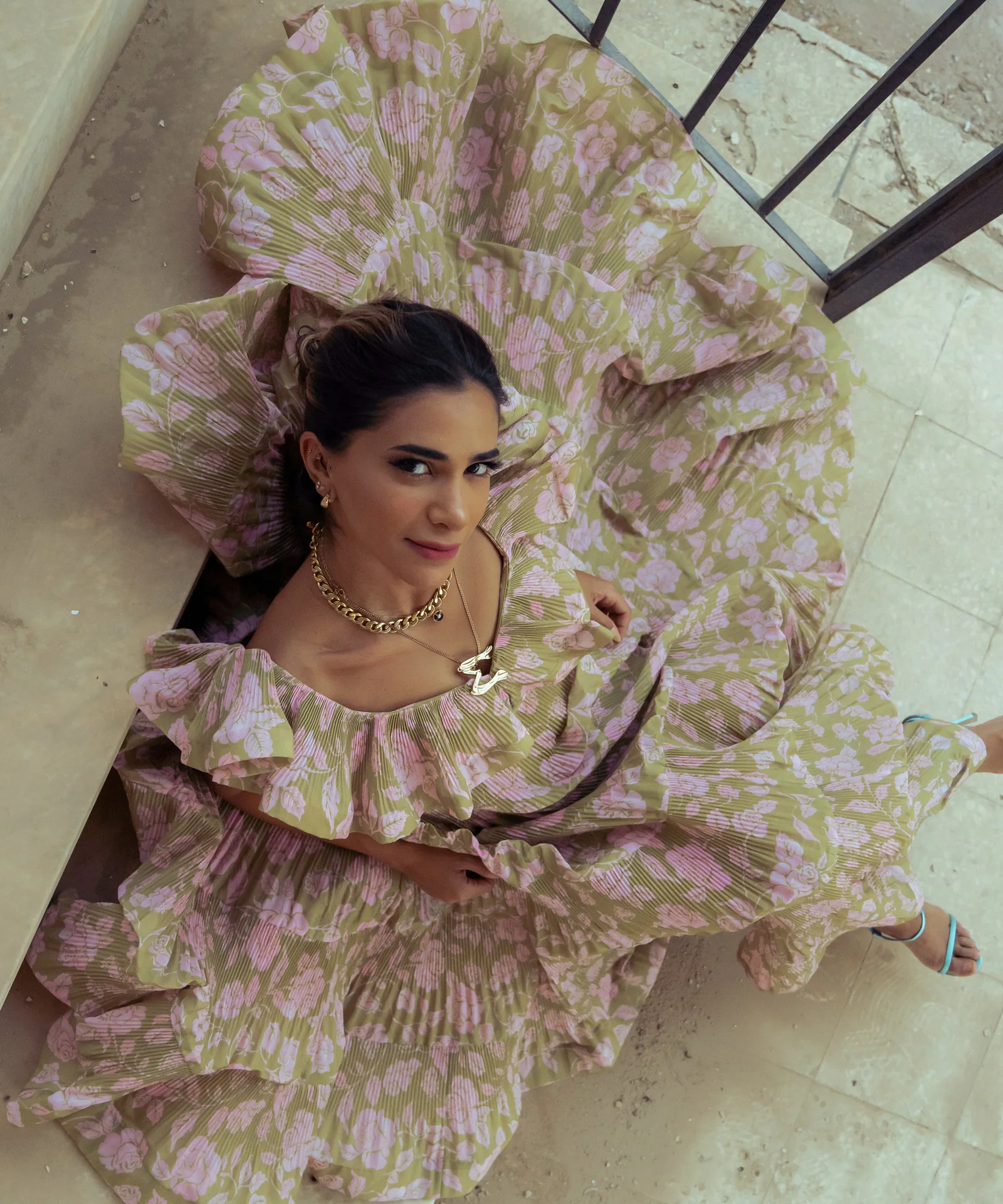 Daylal Al Hajeri in a ruffled printed gown