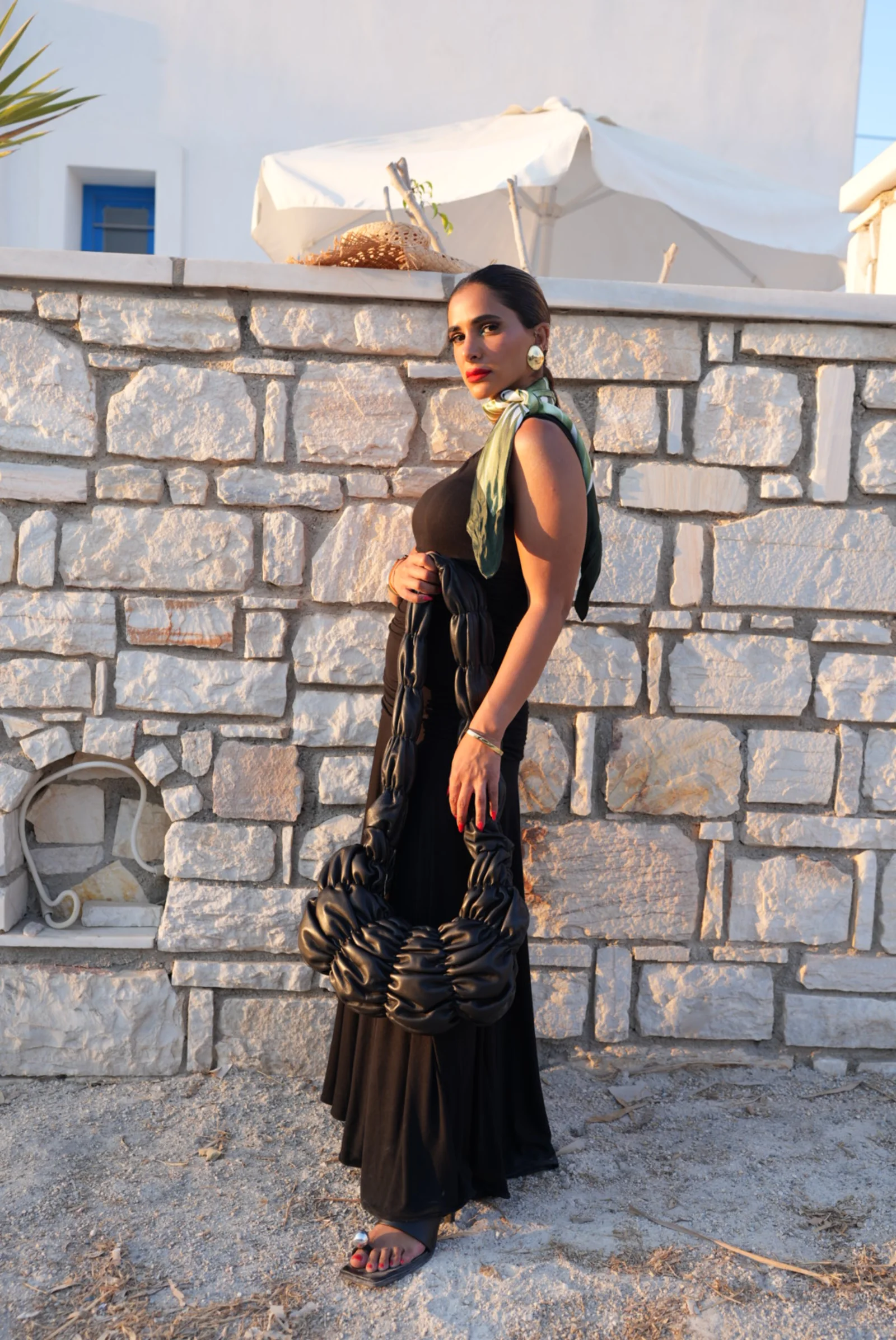 Daylal Al Hajeri in a black embellished gown