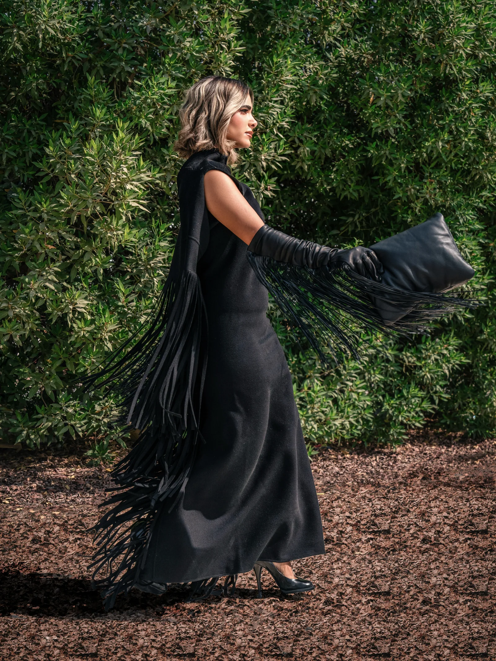 Daylal Al Hajeri in a full-length black look