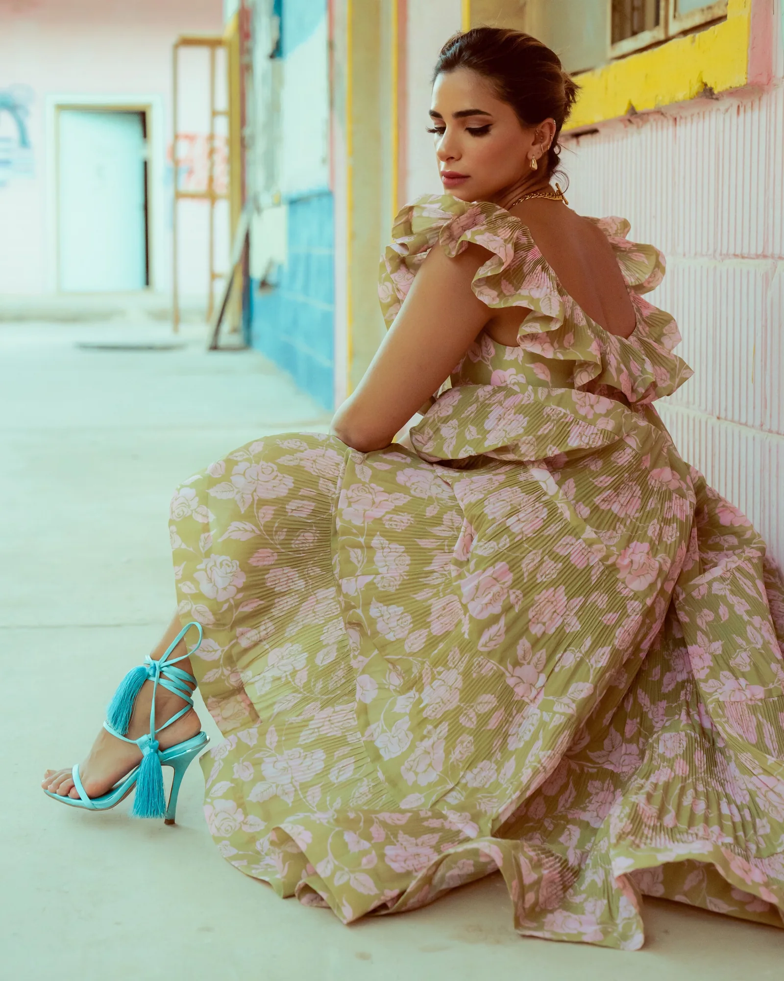 Daylal Al Hajeri in a cream ruffled gown