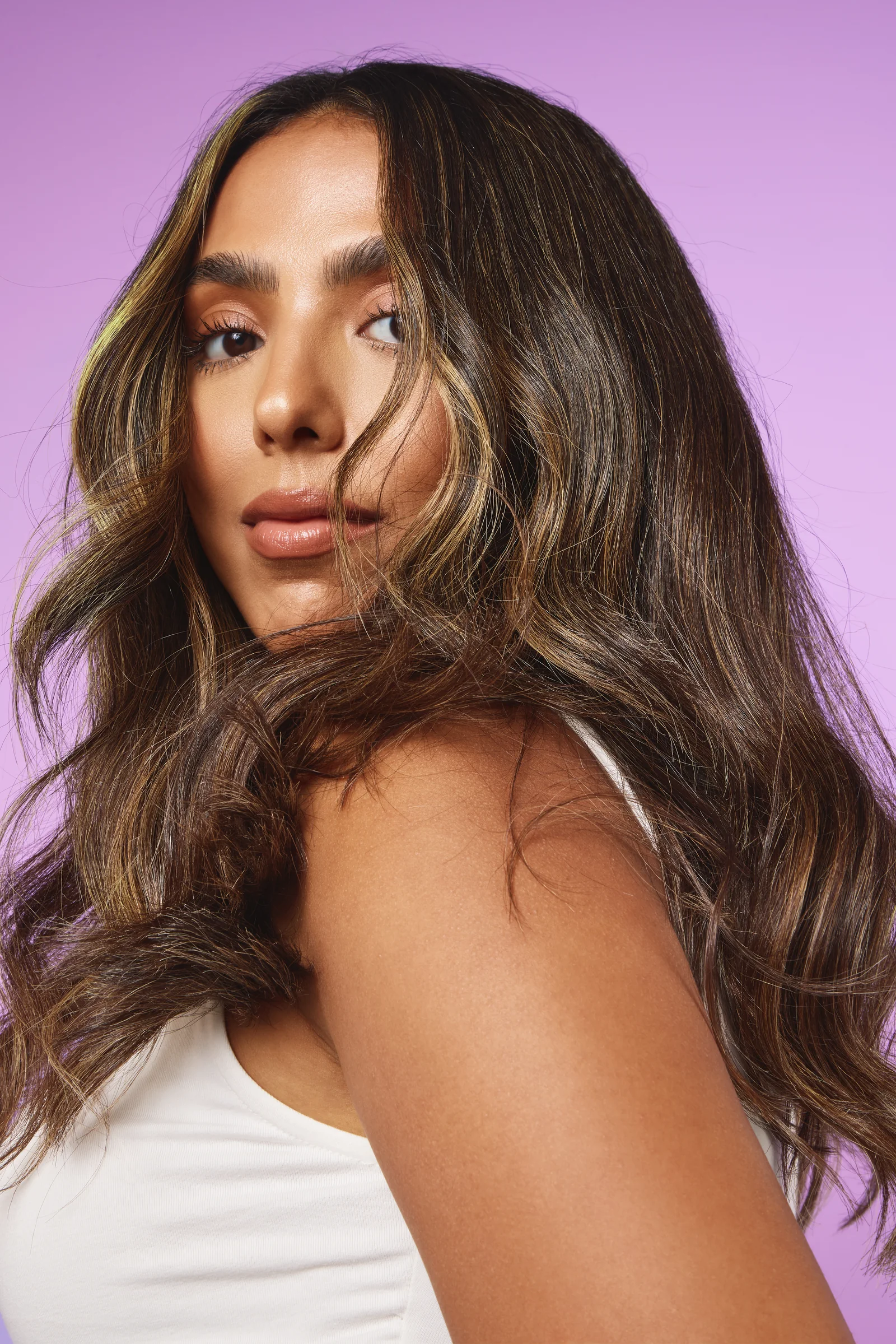 Model with long wavy hair, Sephora haircare campaign