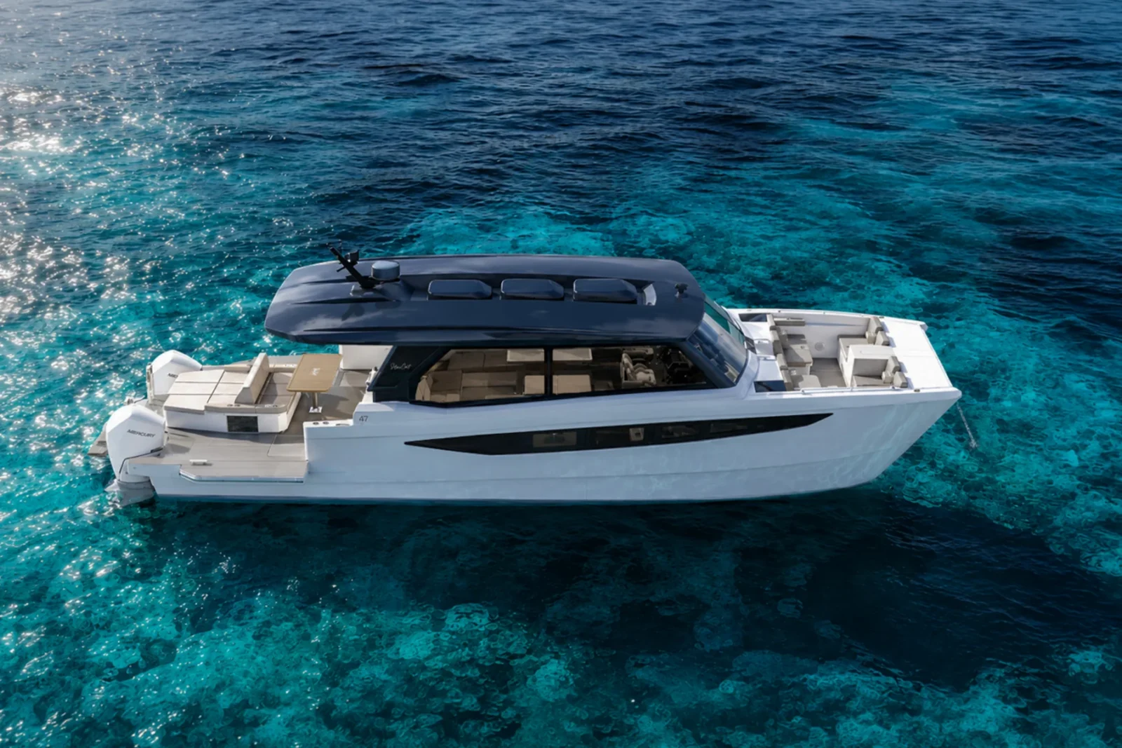 The SilverCat 47 power catamaran under way on turquoise water, side profile