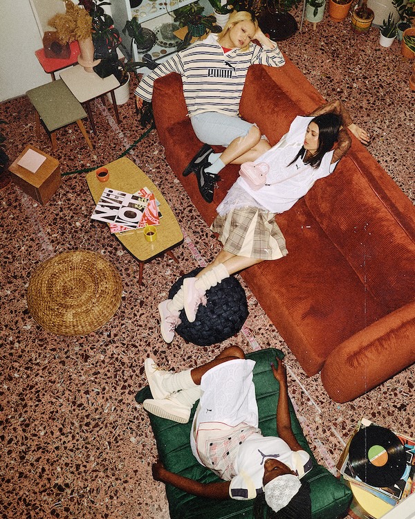 The PUMA Suede Bloom styled in a relaxed living room setting