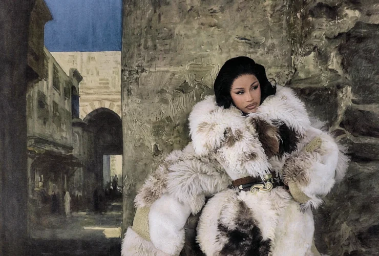 Cardi B in a fur coat photographed in an Orientalist stone alley for Vogue Arabia September 2026