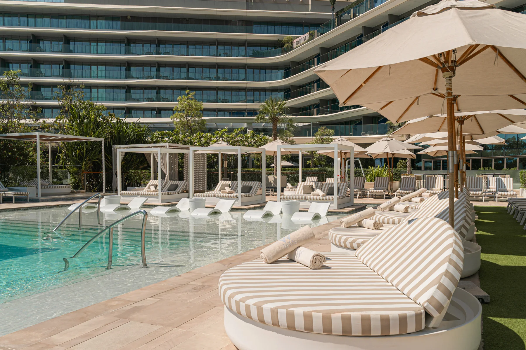 Poolside daybeds at the WET Deck, W Dubai The Palm