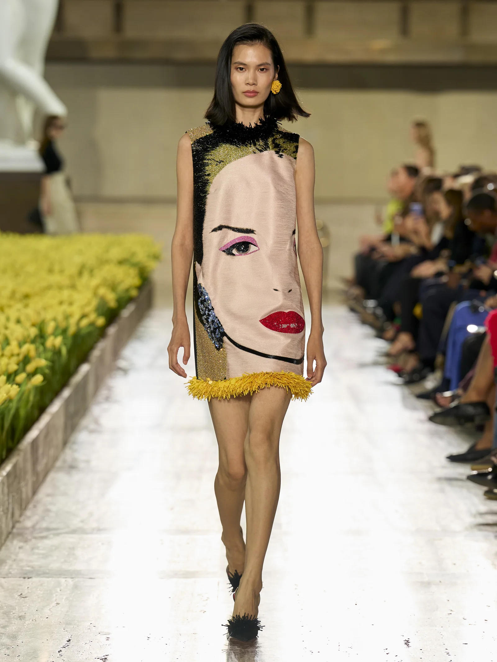 Carolina Herrera Spring 2027 mini dress with an embroidered Andy Warhol portrait at Lincoln Center
