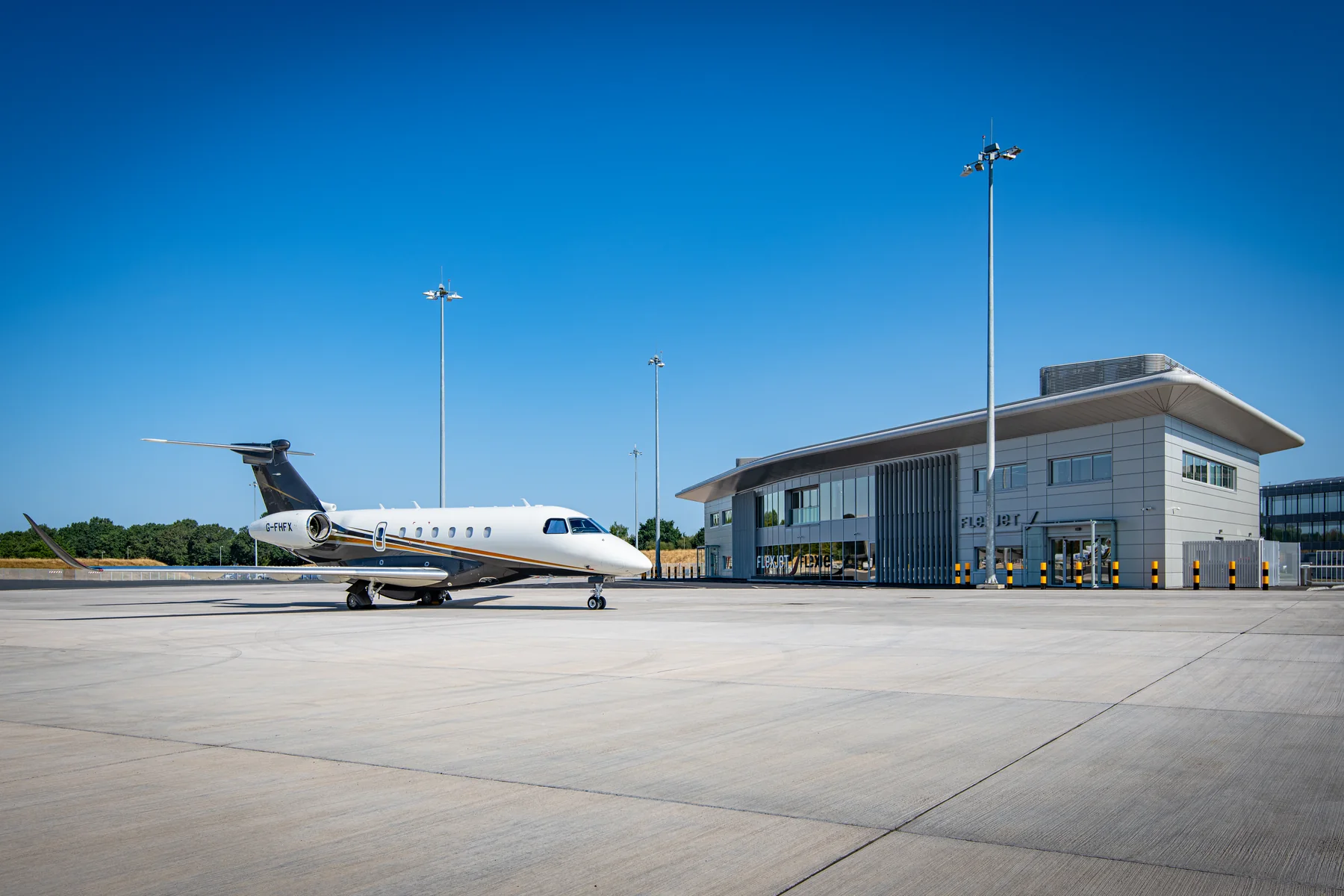 A Flexjet private jet on the ramp beside the new Farnborough terminal