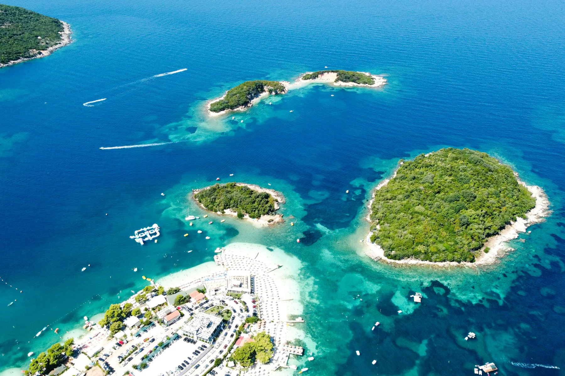 Aerial view of Ksamil's islands and turquoise water on Albania's Ionian coast