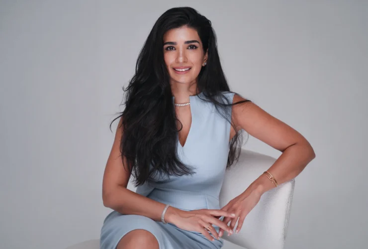 Dr. Noor AlQabandi photographed for Boujeez, seated portrait banner