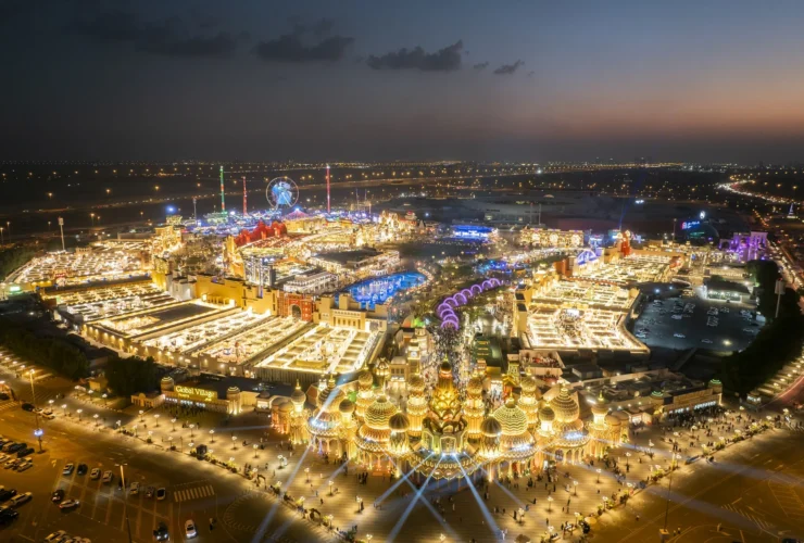 Global Village Dubai at night, aerial view of the lit pavilions