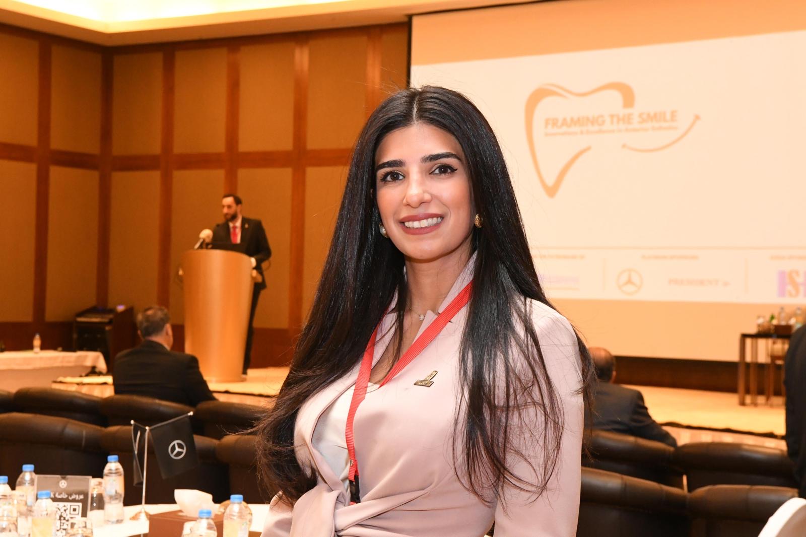 Dr. Noor AlQabandi presenting at the Framing the Smile conference